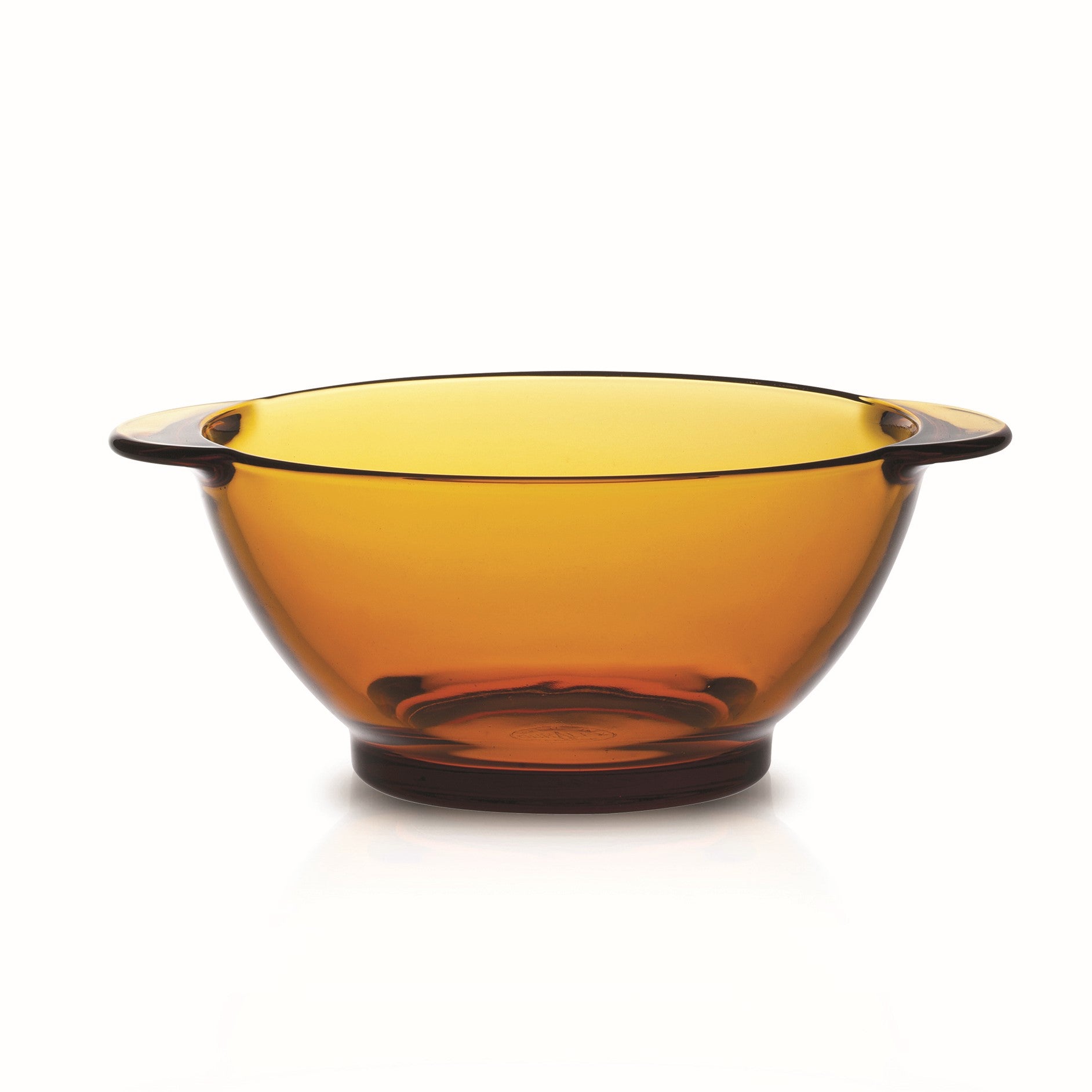 Duralex Lys. The amber/yellow glass bowl with handles. Le bol à oreilles en verre vermeil jaune.