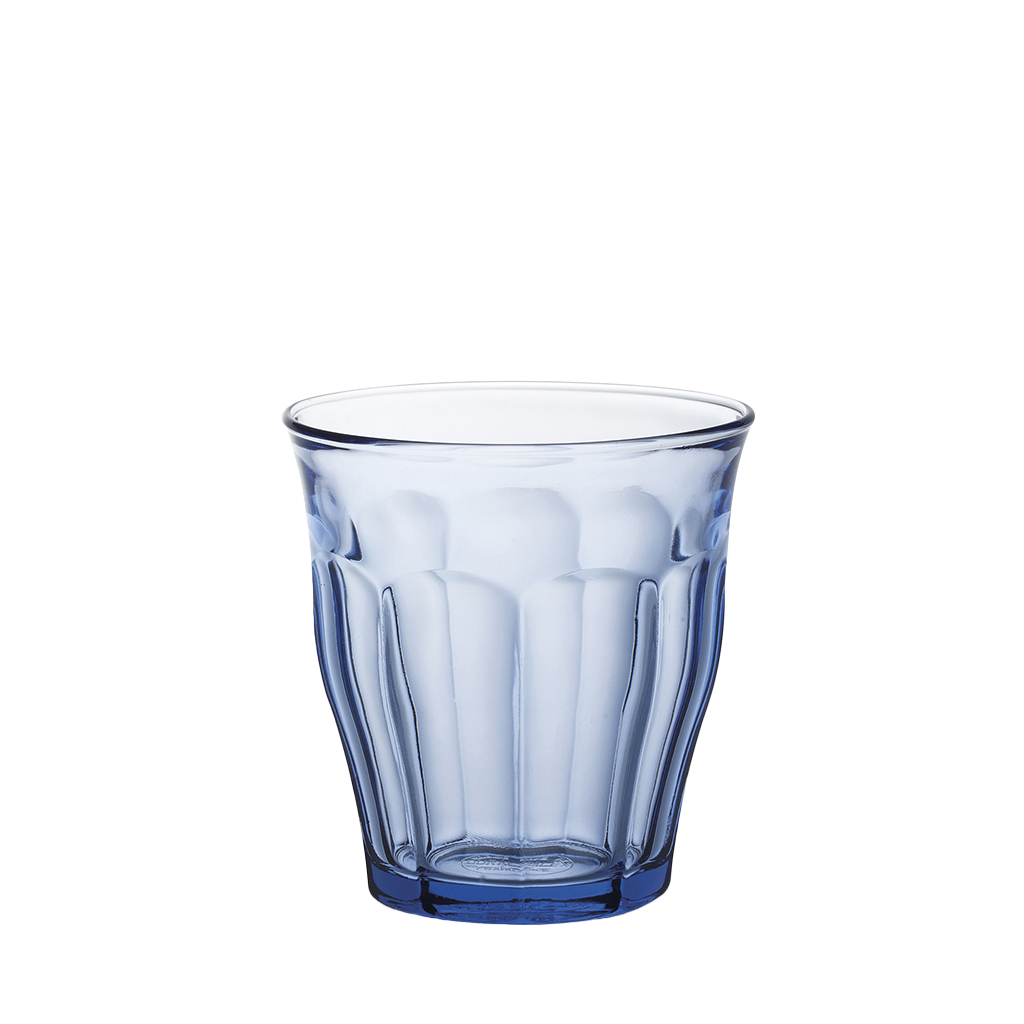 Duralex Le Picardie. The medium sized blue glass tumbler showcasing the beveled curves. Le verre bleu de taille moyenne mettant en valeur les courbes biseautées.